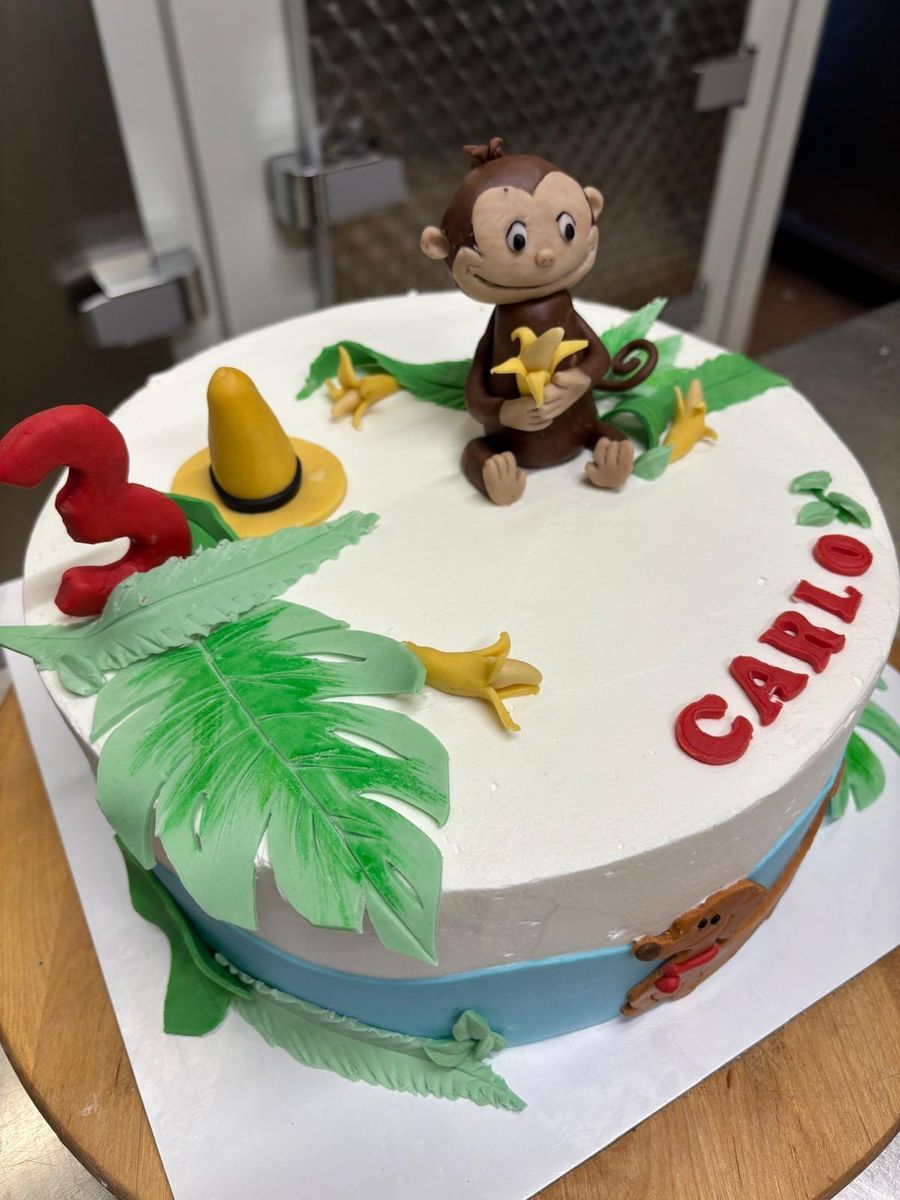 Torta a tema giungla con scimmietta di zucchero